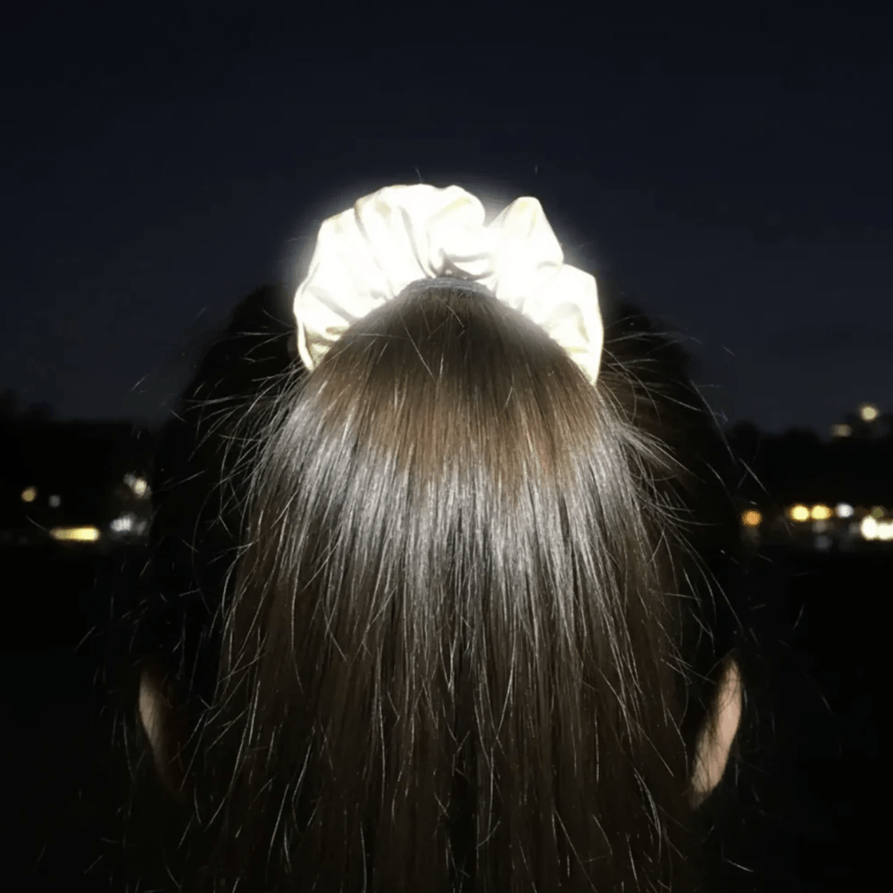 Silver Reflective Hair Srunchie on a poneytail nightime fully reflective backview